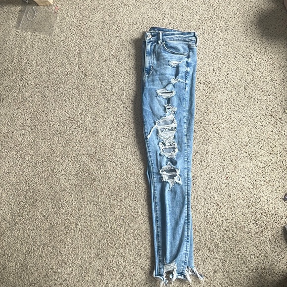 COPY - These are high rise, ripped jeans from American Eagle. The color is ligh… - Picture 3 of 6